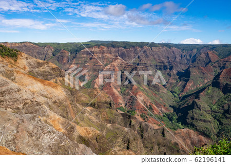 Views of the rocky cliffs and canyon of Waimea Canyon, Kauai, Hawaii Views of the rocky cliffs and canyon of Waimea Canyon, Kauai, Hawaii 62196141