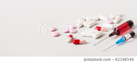 Medicine treatment concept. Various pills and 62196548