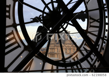 Overlooking the Louvre across the Seine from the Orsay Museum clock Overlooking the Louvre across the Seine from the Orsay Museum clock 62198058