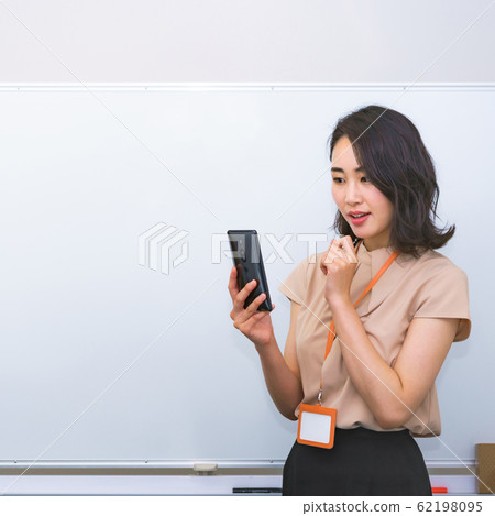 5G Smartphone Demonstration Female Exhibitor Exhibition Business Image Female Smartphone Lifestyle Business 5G Smartphone Demonstration Female Exhibitor Exhibition Business Image Female Smartphone Lifestyle Business 62198095