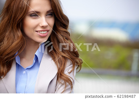 Young happy women or student on the property 62198487