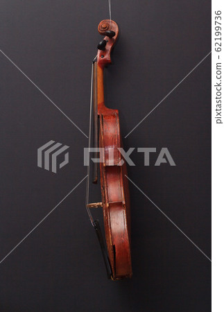 Broken antique red violin for restoration with damage 62199736