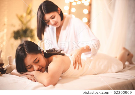 Asian Beautiful, young and healthy woman in spa Asian Beautiful, young and healthy woman in spa 62200969