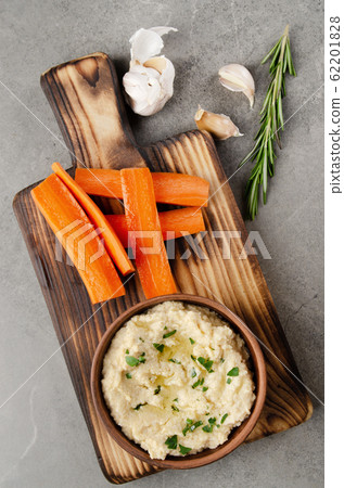 Flat lay view at vegetable Hummus dip dish topped Flat lay view at vegetable Hummus dip dish topped 62201828