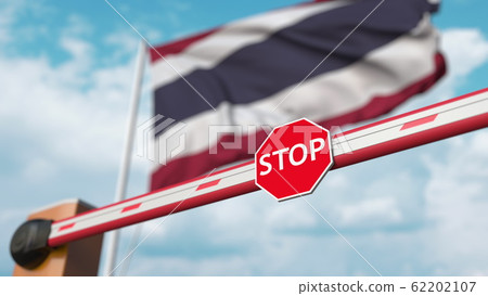 Closed boom barrier with stop sign against the Thai flag. Restricted border crossing or certain ban in Thailand. 3D rendering Closed boom barrier with stop sign against the Thai flag. Restricted border crossing or certain ban in Thailand. 3D rendering 62202107