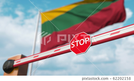 Closed boom barrier with stop sign against the Lithuanian flag. Restricted border crossing or certain ban in Lithuania. 3D rendering Closed boom barrier with stop sign against the Lithuanian flag. Restricted border crossing or certain ban in Lithuania. 3D rendering 62202158