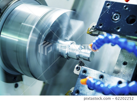 The CNC lathe machine in metal working. The CNC lathe machine in metal working. 62202252