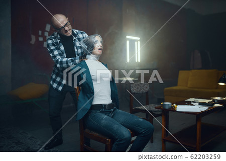 Maniac kidnapper smothers his scared female victim 62203259