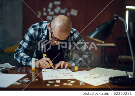 Maniac kidnapper hands cuts out letters Maniac kidnapper hands cuts out letters 62203281