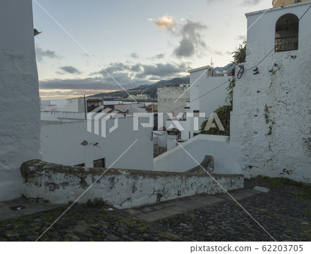 Old stone stairs with shabby white walls at the center of Santa Cruz De La Palma, La Palma Island, Canary Islands, Spain Old stone stairs with shabby white walls at the center of Santa Cruz De La Palma, La Palma Island, Canary Islands, Spain 62203705