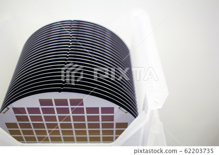 Silicon Wafers in white plastic holder box on a 62203735