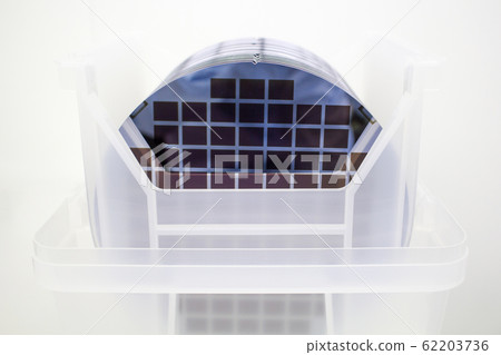 Silicon Wafers in white plastic holder box on a 62203736