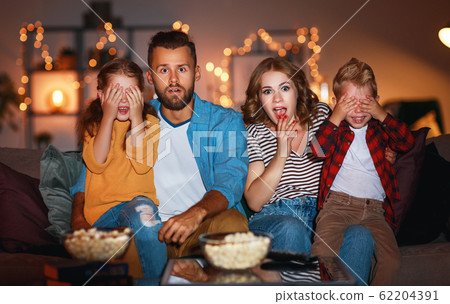 family mother father and children watching family mother father and children watching 62204391