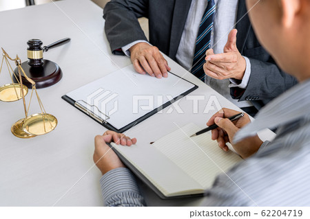 Judge gavel with scales of justice, Businessman 62204719