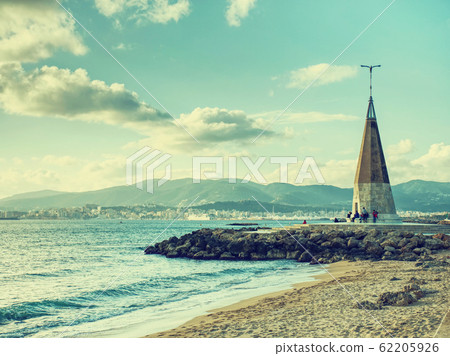 People along seagull obelisk at promenade People along seagull obelisk at promenade 62205926