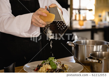 Caucasian chef cooking pasta 62212053