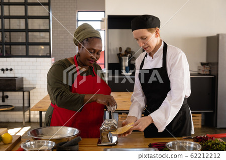 Chefs cooking together Chefs cooking together 62212212