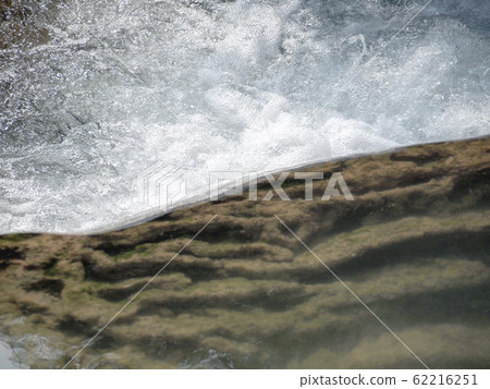 Water fall in spring season located in deep rain Water fall in spring season located in deep rain 62216251