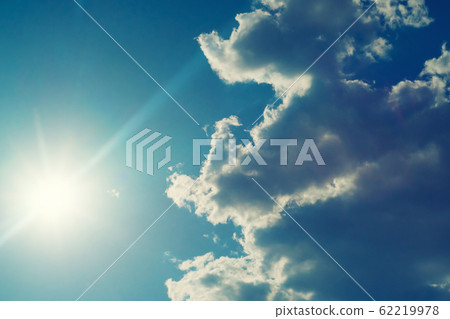 The sun shines bright in summer. Blue sky and 62219978