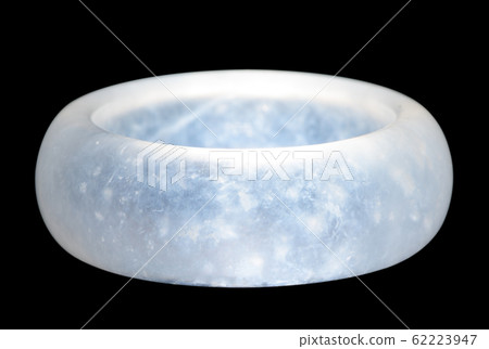 Jade ring on black background 62223947