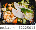 Caesar salad with chicken in lunchbox 62225013