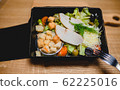 Caesar salad with chicken in lunchbox 62225016