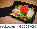Caesar salad with red fish, crackers, tomatoes and cheese 62225020