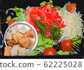 Caesar salad with red fish, crackers, tomatoes and cheese 62225028