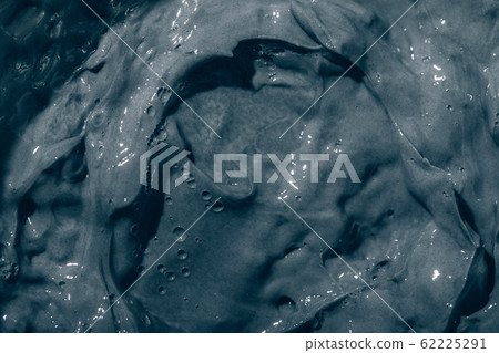 Texture of black clay mask cream to the face and body. Cleansing skin care close up. Background 62225291