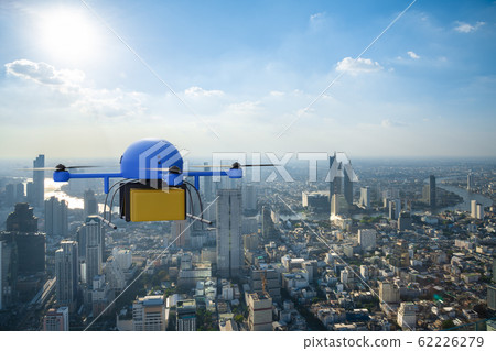 Delivery drone used to transport packages flying Delivery drone used to transport packages flying 62226279