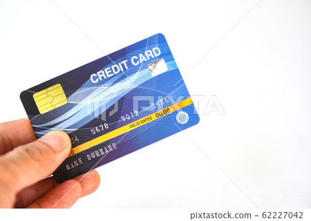 hand holding credit card on white background - 62227042