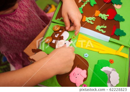 Learning numbers and animals using a quiet book Learning numbers and animals using a quiet book 62228823