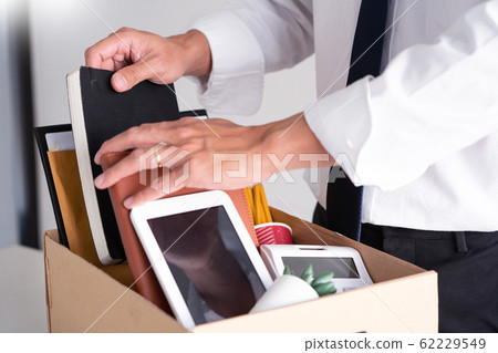 Sad Fired Young Employee businessmen hold boxes 62229549