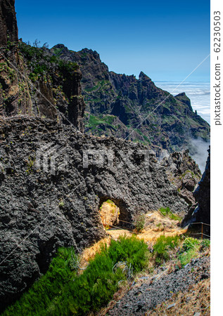 Pedestrian path near the top of mountain range Pedestrian path near the top of mountain range 62230503