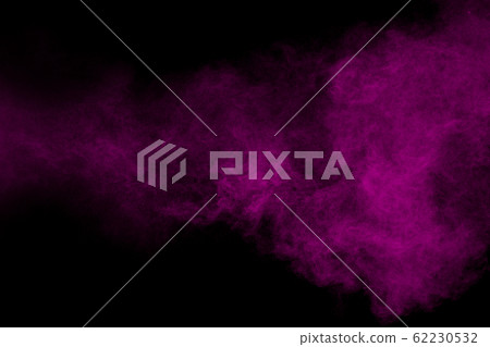 Purple color powder explosion cloud  on black background.Purple dust particles splash. 62230532