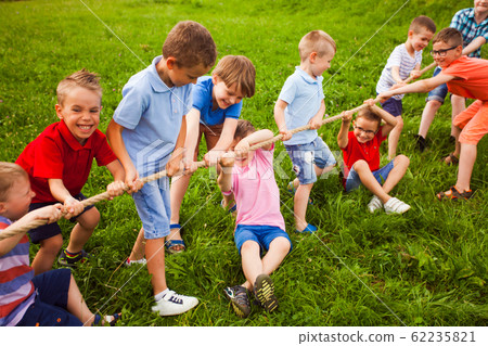 The guys are measured by the strength in the game of tug of war The guys are measured by the strength in the game of tug of war 62235821