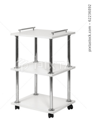 Mobile cart on wheels for cosmetologist on white isolated background. 62236892