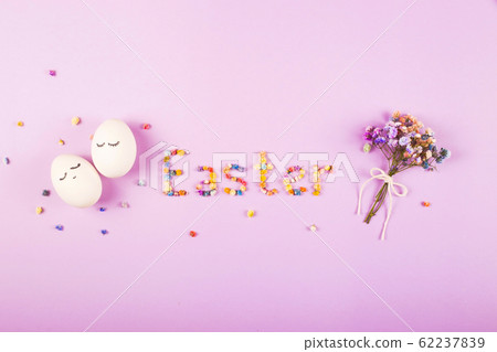 The word Easter is written in small colorful The word Easter is written in small colorful 62237839
