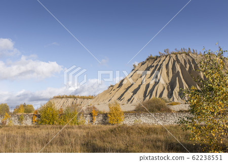 Mountain of white sand. A white mountain of white stones in Rummu Vasalema Estonia. Mountain of white sand. A white mountain of white stones in Rummu Vasalema Estonia. 62238551