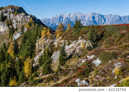 Peaceful autumn Alps mountain sunny view from hiking path from Dorfgastein to Paarseen lakes, Land Salzburg, Austria. Peaceful autumn Alps mountain sunny view from hiking path from Dorfgastein to Paarseen lakes, Land Salzburg, Austria. 62238748