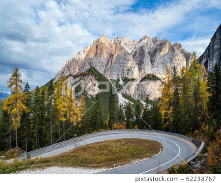 Autumn morning alpine Dolomites mountain scene. Peaceful Valparola Path view, Belluno, Italy. 62238767