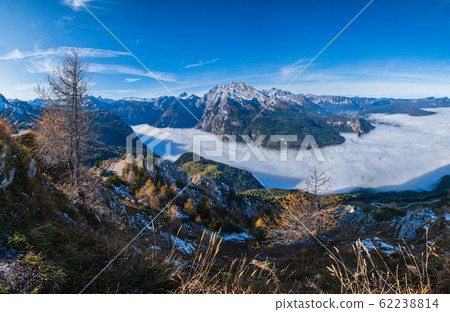 Autumn Alps mountain misty morning view, Schonau am Konigssee, Berchtesgaden national park, Germany. Autumn Alps mountain misty morning view, Schonau am Konigssee, Berchtesgaden national park, Germany. 62238814
