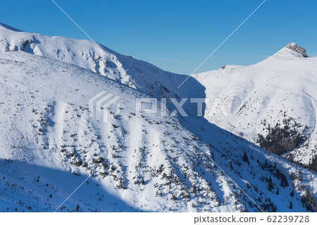 Winter mountain in Poland from Tatras - Kasprowy Winter mountain in Poland from Tatras - Kasprowy 62239728