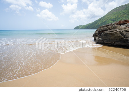 Nice Caribbean beach with sea sand and blue sky 62240706