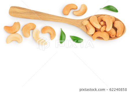 Roasted Cashew nuts in spoon isolated on white background with clipping path and full depth of field. Top view with copy space for your text. Flat lay Roasted Cashew nuts in spoon isolated on white background with clipping path and full depth of field. Top view with copy space for your text. Flat lay 62240858