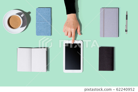 Person using a tablet computer Person using a tablet computer 62240952