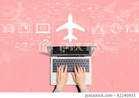 Flight ticket booking concept with person using laptop Flight ticket booking concept with person using laptop 62240955