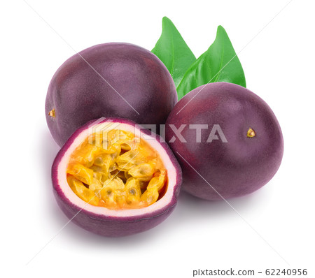 Two whole passion fruits with leaves and a half isolated on white background. Isolated maracuya 62240956
