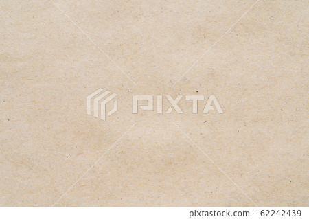 Background sheet of yellow carton cardboard. Close-up abstract carton pattern 62242439