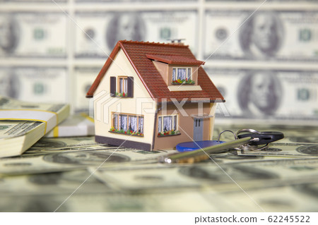 A small house with keys on the background of 62245522